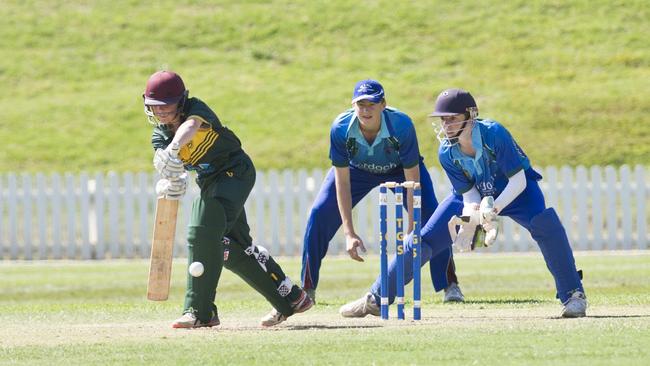 Hayden Brough and Darling Downs and South West Queensland wicket keeper Mathew Nunn keeps a sharp eye on play as Wynnum Manly’s Hayden Brough plays a shot during their Lord Taverner's clash.