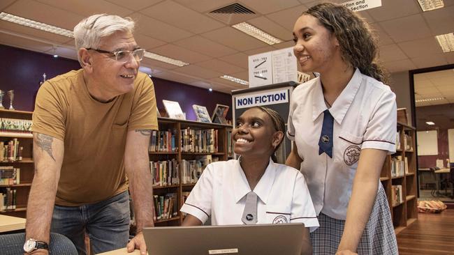 Warren Mundine talks with St Monica’s AIEF students Delphina Day (year 10) and LaShontae Owens-Edwards (year 11). Picture: Brian Cassey