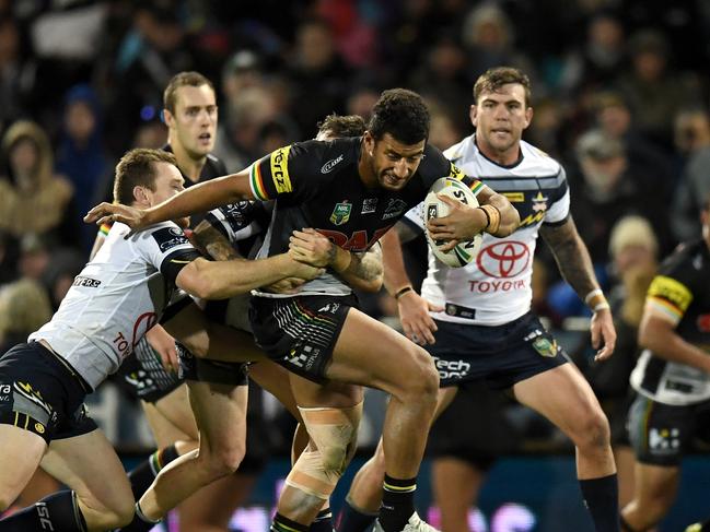 Viliame Kikau of the Panthers is tackled by Michael Morgan of the Cowboys during the Round 9 NRL match between the Penrith Panthers and the North Queensland Cowboys at Carrington Park in Bathurst, Friday, May 4, 2018. (AAP Image/Dean Lewins) NO ARCHIVING, EDITORIAL USE ONLY