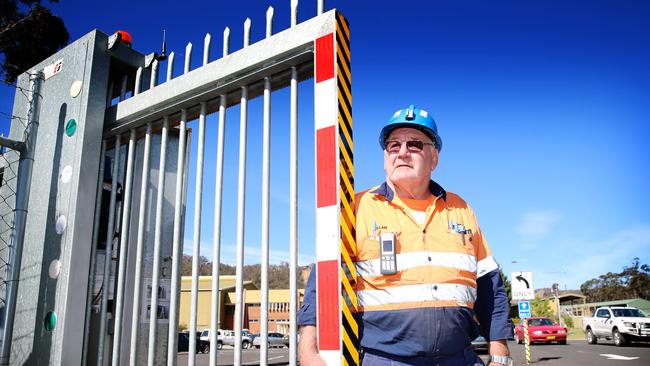 Coal miner for 25 years, Alan, pictured closing the gates at Angus Place Colliery where workers were informed in 2014 that the coal mine was closing, near the Wallerawong. Picture Craig Greenhill