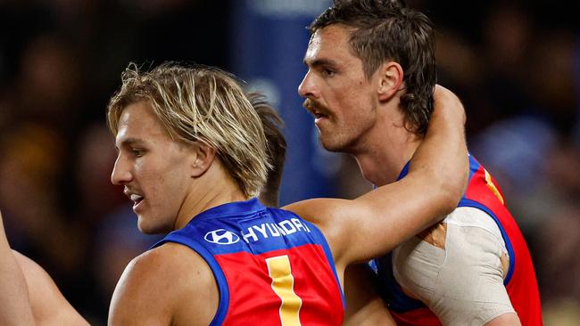 MELBOURNE, AUSTRALIA - JUNE 07: Joe Daniher of the Lions celebrates a goal with teammate Kai Lohmann during the 2024 AFL Round 13 match between the Western Bulldogs and the Brisbane Lions at Marvel Stadium on June 07, 2024 in Melbourne, Australia. (Photo by Dylan Burns/AFL Photos via Getty Images)