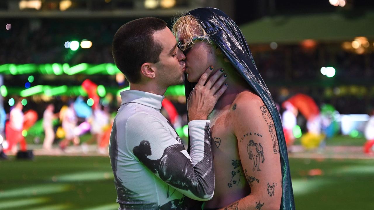 A couple kiss during the 44th Sydney Gay and Lesbian Mardi Gras Parade at the Sydney Cricket Ground. Picture: AFP