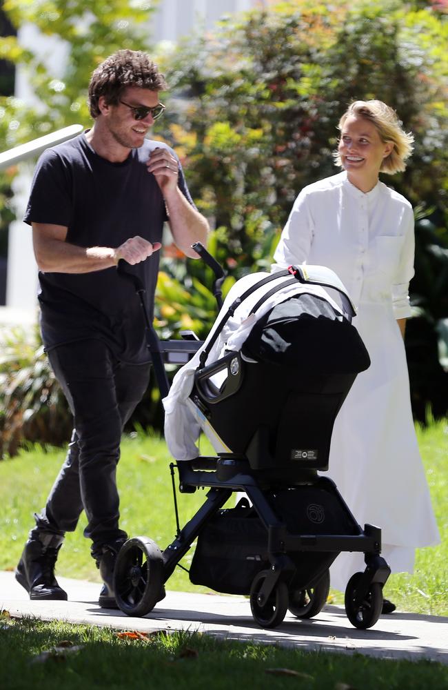 Happy family ... Lara Bingle and Sam Worthington seen out as a family with baby Rocket as they visit a farmers market in LA. Picture: Splash