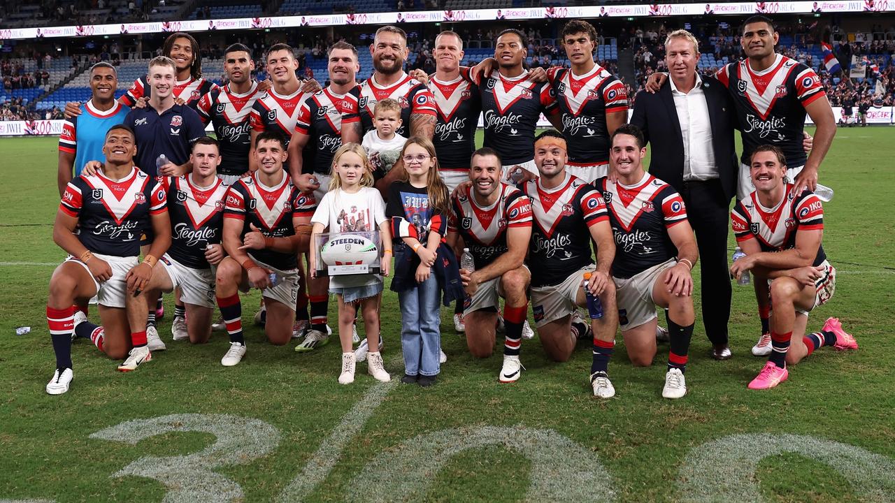 Jared Waerea-Hargreaves of the Roosters poses with teammates following his 300th match. (Photo by Cameron Spencer/Getty Images)