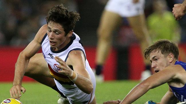 Chayce Jones of the Crows (left) contests with Trent Dumont of the Kangaroos during the Round 4 AFL match at Marvel Stadium. Picture: AAP Image/Hamish Blair