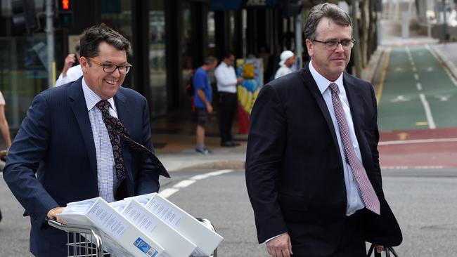 Clive Palmer’s barristers Damien Atkinson, left, and Simon Couper in Brisbane yesterday.