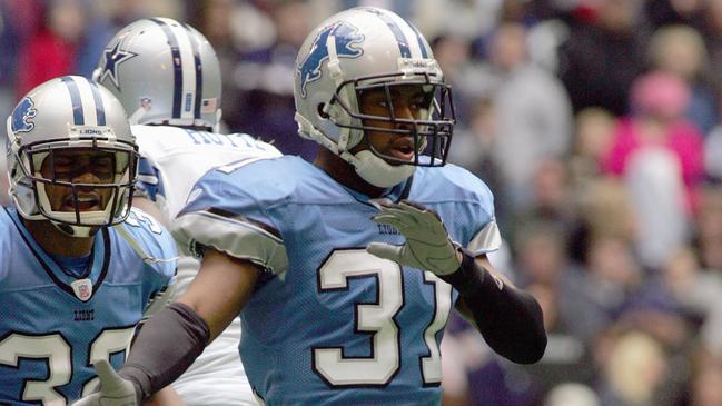 Stanley Wilson celebrates on the field during a game against the Dallas Cowboys at Texas Stadium on December 31, 2006. (Photo by Ronald Martinez/Getty Images)