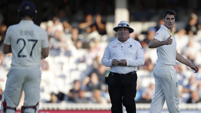 Pat Cummins checks on Rory Burns after he hit the batsman. Picture: Getty Images