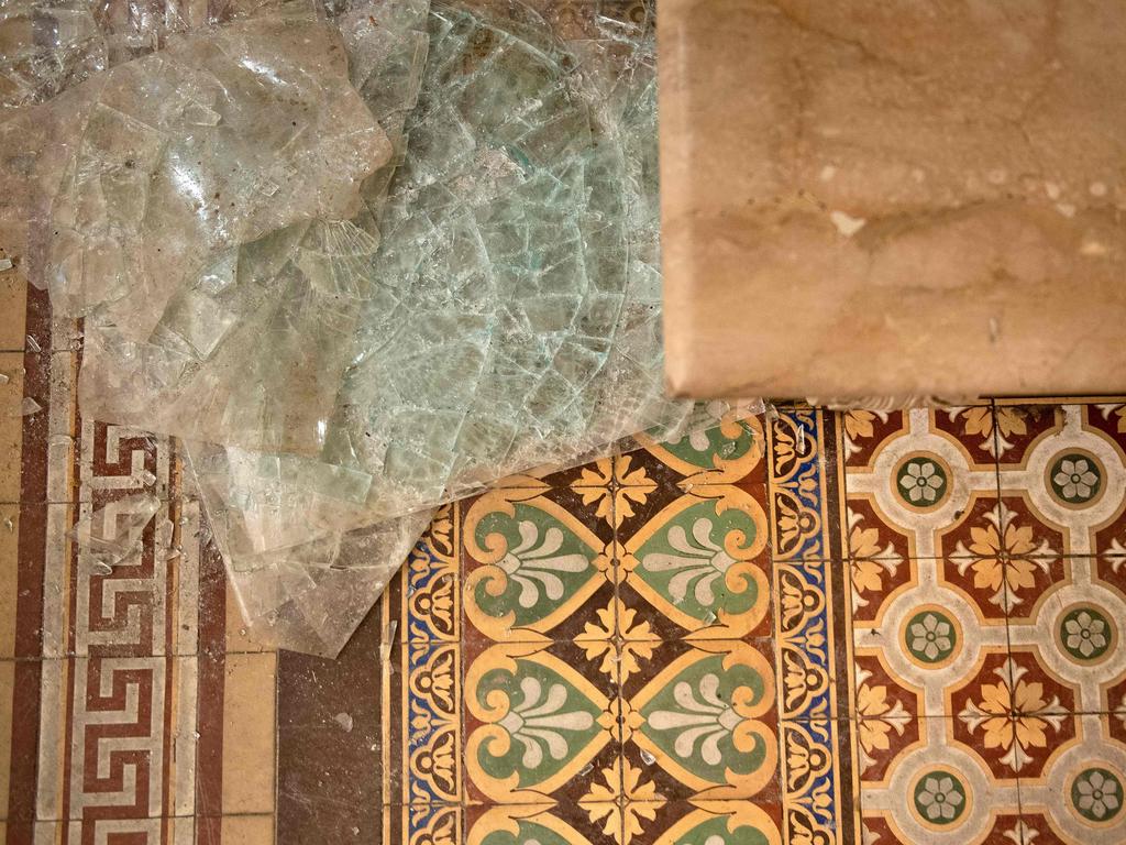 Damage is seen near a breached window in the House of Representatives. Picture: AFP