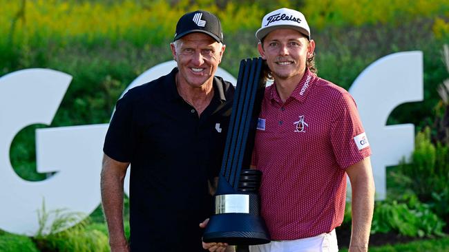 (FILES) In this file photo taken on September 18, 2022 team Captain Cameron Smith of Punch GC poses with Greg Norman, CEO and commissioner of LIV Golf, after winning the individual title during Day Three of the LIV Golf Invitational - Chicago at Rich Harvest Farms in Sugar Grove, Illinois. - LIV Golf is close to sealing a deal with broadcaster Fox Sports which will see the Saudi-funded circuit pay for coverage on television, a US media report said September 28, 2022. (Photo by Quinn Harris / GETTY IMAGES NORTH AMERICA / AFP)