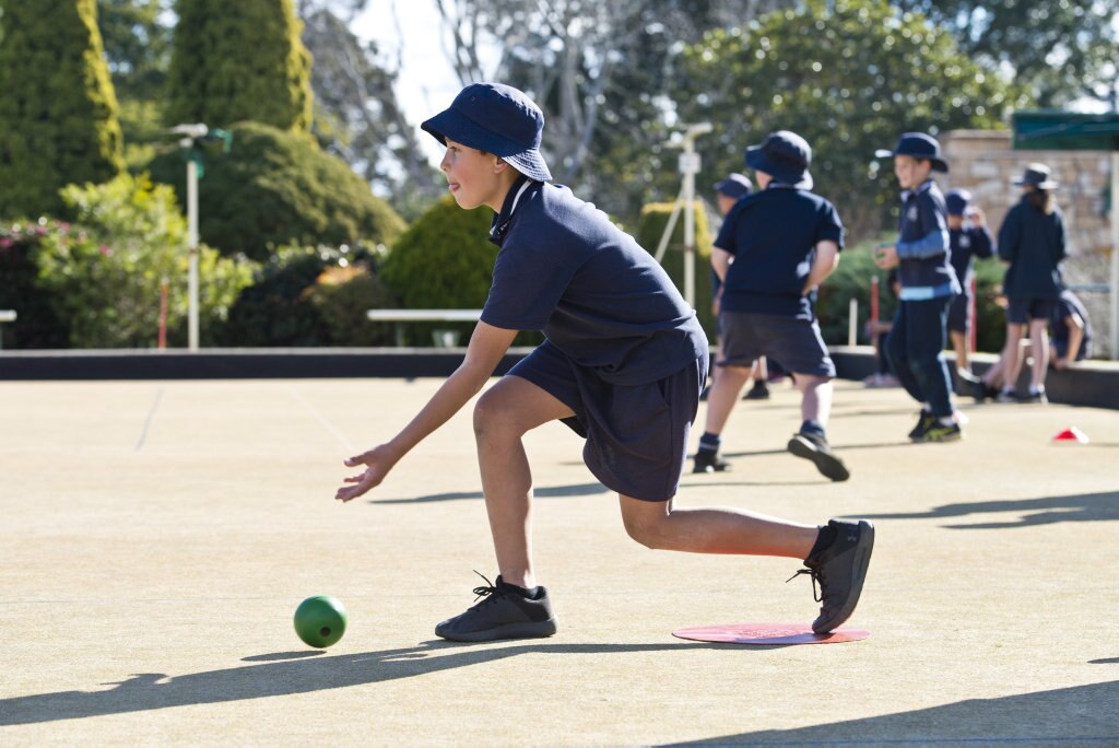 Elliott Tupas bowls as Toowoomba Bowls Club host students of Toowoomba East State School, Monday, June 25, 2018. Picture: Kevin Farmer