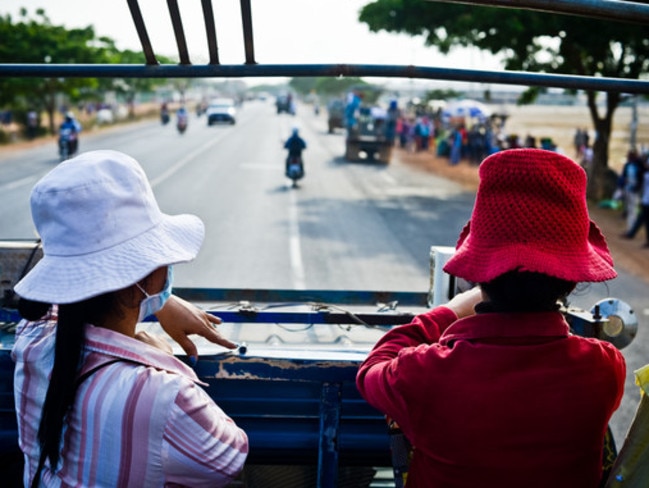 Workers travel home from a garment factory in Phnom Penh. Picture: Samer Muscati/Human Rights Watch.