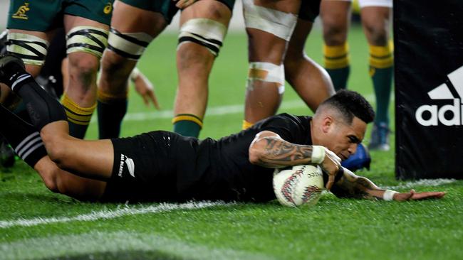 New Zealand's Aaron Smith scores a try. Picture: AFP