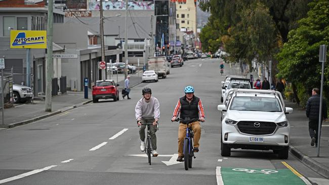 Ben Harrison and Andrew Campbell riding along Collins Street. Picture: Hobart City Council.