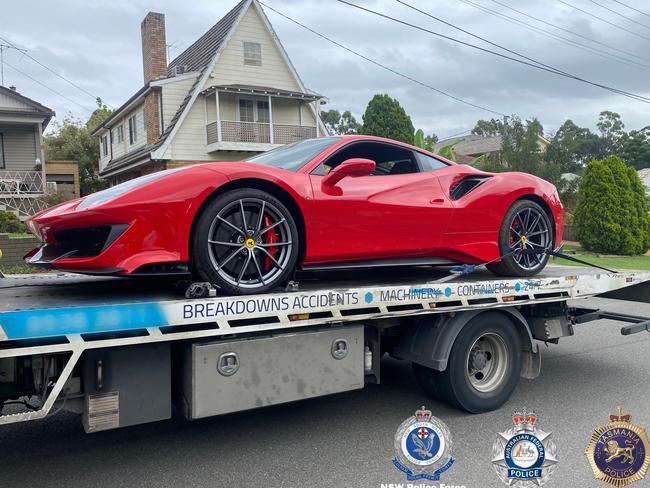 Four luxury vehicles and a motorcycle, valued at more than $2 million, were seized by police. Picture: NSW Police Force and Tasmania Police