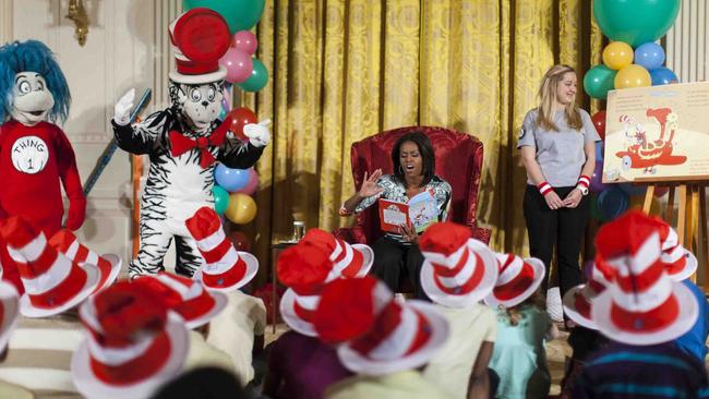 Michelle Obama reads Dr Seuss to local students as part of her "Let's Move, Let's Read!" initiative in 2015. Picture: Getty