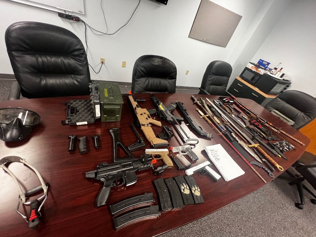 Police allegedly recovered a collection of airsoft rifles, pistols and fake ammunition along with knives and swords. Picture: Volusia County Sheriff’s Office