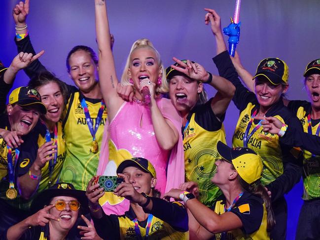 Katy Perry, performs on stage while pregnant with the Australian women's cricket team after the Women's T20 World Cup final match between Australia and India at the MCG in Melbourne, Sunday, March 8, 2020. (AAP Image/Scott Barbour) NO ARCHIVING, EDITORIAL USE ONLY, IMAGES TO BE USED FOR NEWS REPORTING PURPOSES ONLY, NO COMMERCIAL USE WHATSOEVER, NO USE IN BOOKS WITHOUT PRIOR WRITTEN CONSENT FROM AAP