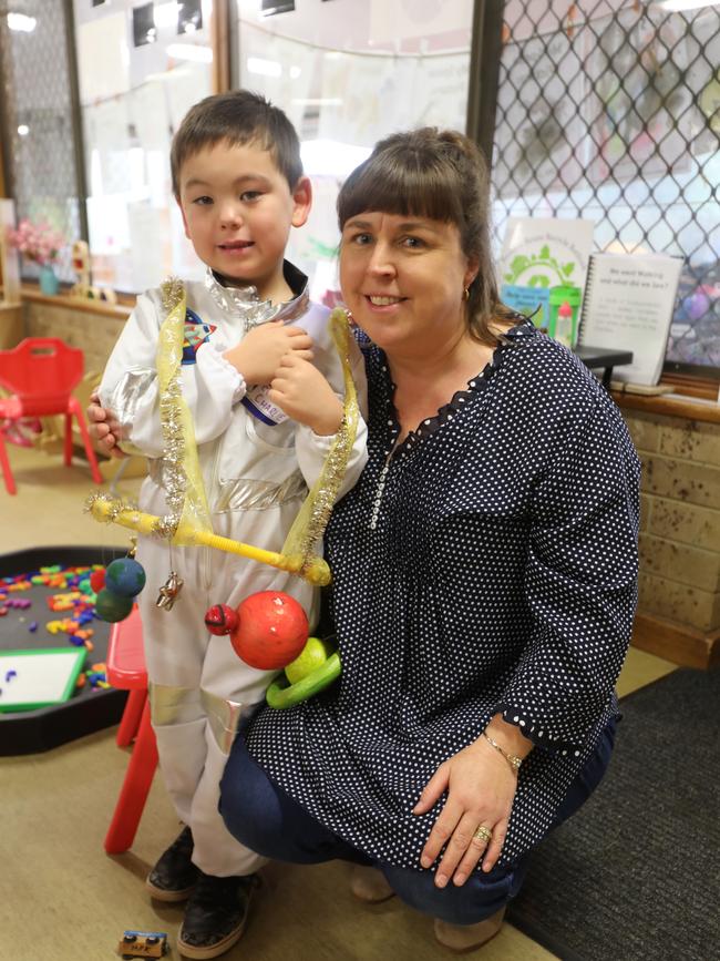 With the help of his teacher Kathleen Dowling at Munno Para Kindergarten, Charlie White, then aged 4, wrote to he wrote to the International Astronomical Union to challenge their decision on Pluto. Supplied: Australian Academy of Science.