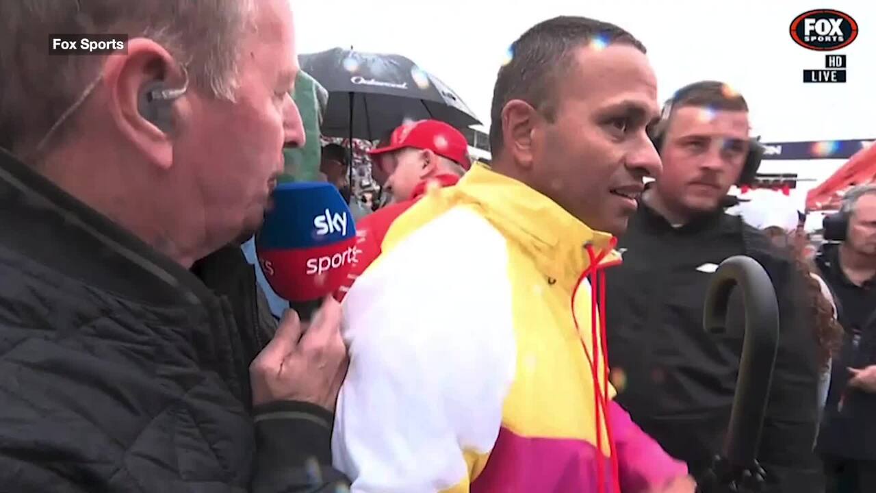 Usman Khawaja pops up during Formula 1 grid walk