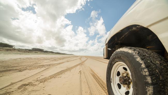 April 20, 2016: Low angle view of a 4x4 on sand. Picture: Istock