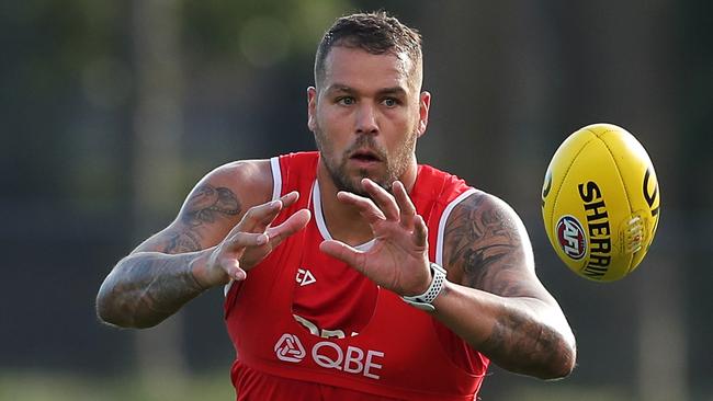 Lance Franklin handles the ball during a Sydney Swans AFL training session at Lakeside Oval on Monday. Picture: Matt King/Getty Images