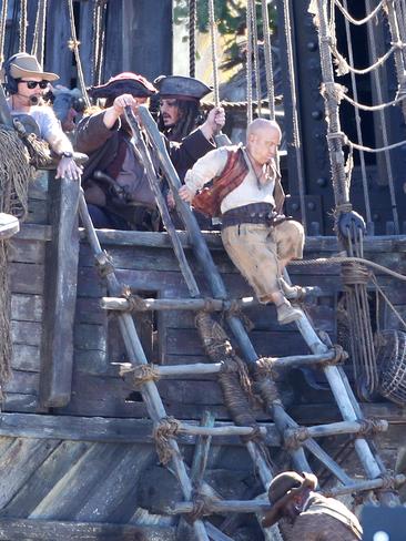 Stunt doubles for members of Captain Jack Sparrow’s crew on the Pirates of the Caribbean: Dead Men Tell No Tales set at The Spit. Pics Tim Marsden