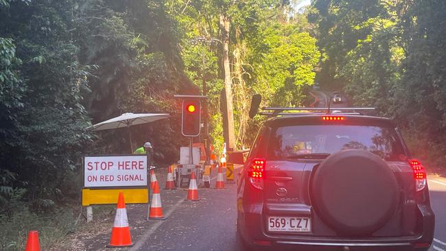 Mobile traffic lights have been in operation at the Streets Creek crossing since December 2023 when landslides damaged the road. Picture: Peter Carruthers