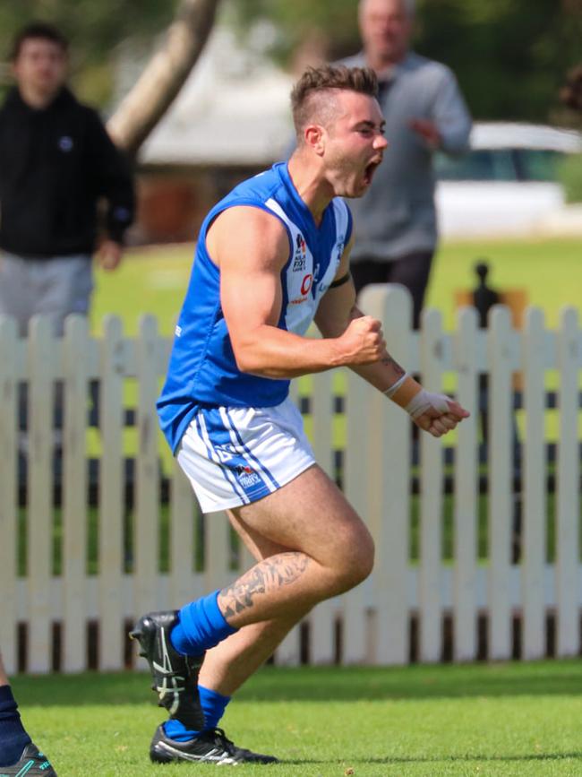 Athelstone's Brian Gill celebrates one of his three goals as defeated Scotch Old Collegians on Saturday in their round one clash – the Raggies’ first victory since the 2019 grand final. Picture: Brayden Goldspink