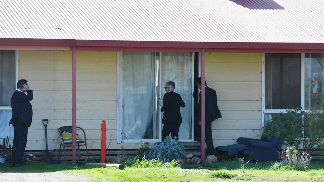 Major Crime detectives search a property in Pinkerton Plains, north of Adelaide in May last year over the death of Michael Purse. Picture: AAP / David Mariuz