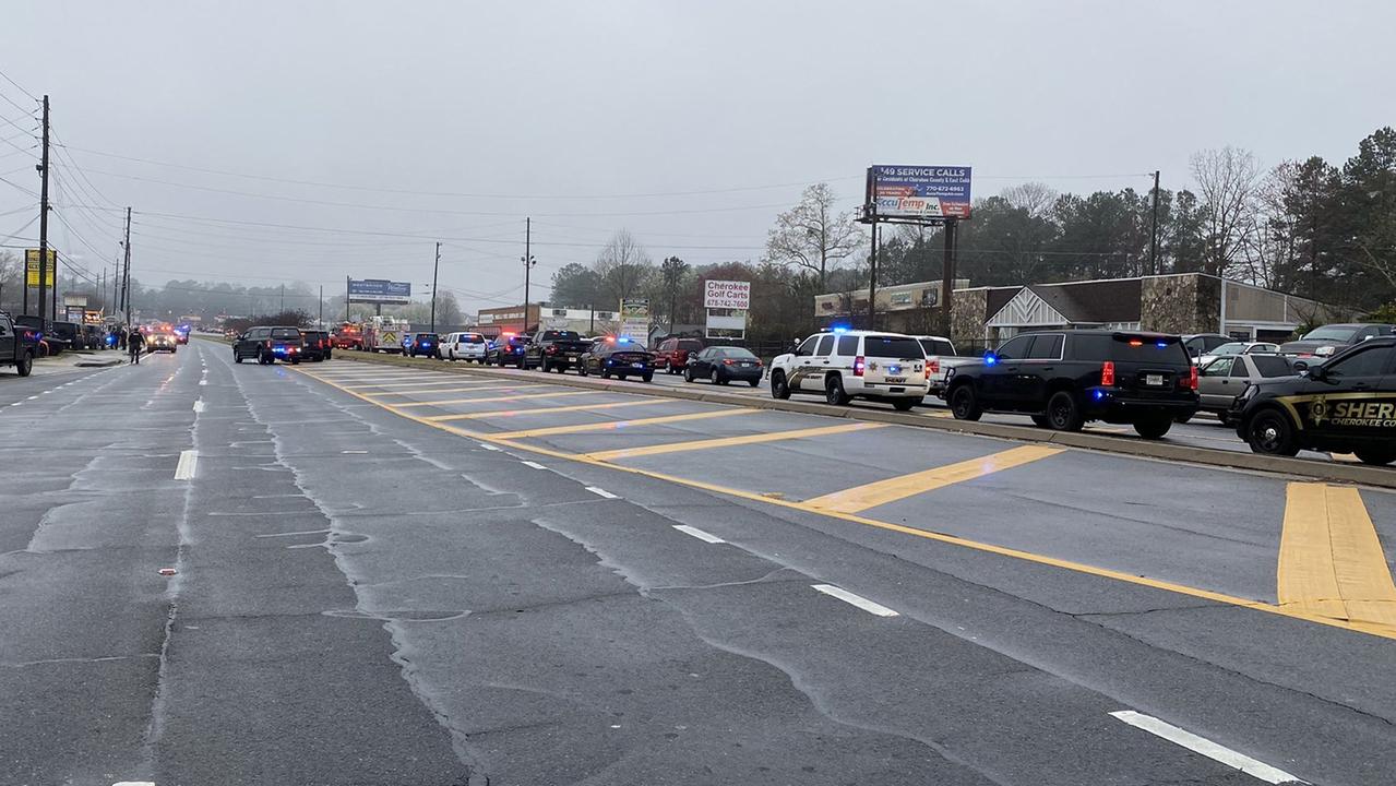 A line of police cars block the area of a shooting at a spa in Atlanta. Picture: Cherokee Sheriff’s Office/AFP