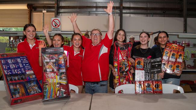Rob Balfour with the team at the Fireworks Warehouse at Darwin show grounds sale on Territory Day. Picture: Pema Tamang Pakhrin
