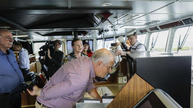 Prime Minister Scott Morrison visits the Australian Navy base HMAS Cairns with Defence Industry Minister Melissa Price and federal member for Leichhardt Warren Entsch 2021. Picture: NCA Newswire / Sean Davey