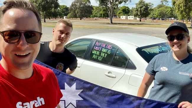 CFMEU lawyer Peter Russell (centre) campaigning with Ash the Ambo during the 2022 SA election. Source: Facebook