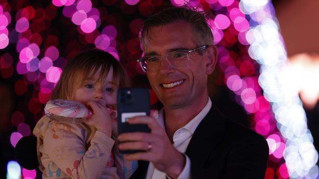 Former NSW Premier Dominic Perrottet looking at the Christmas lights with his daughter Beatrice at Noel Christmas markets last year. The event has been binned. Picture: Jonathan Ng