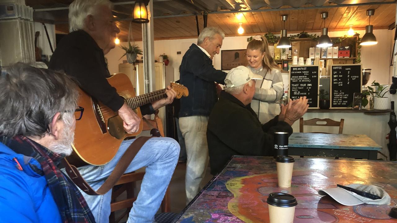 BOMBA Coffee House owner Beck Payne being sung happy birthday by her most-regular customers. Picture: Ian Torode