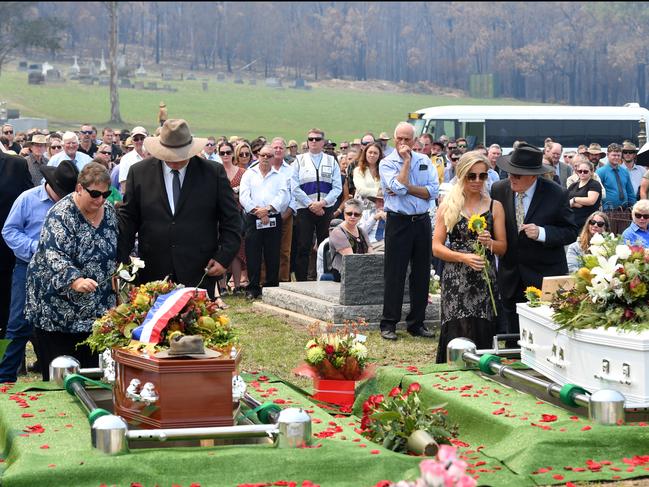 COBARGO, AUSTRALIA - JANUARY 24: Janelle Salway (L) and Renee Salway (R) during the funeral of Patrick and Robert Salway on January 24, 2020 in Cobargo, Australia. Patrick and Robert Salway died trying to protect their home on the NSW South Coast on New Year's Eve. 29-year-old Patrick stayed with his 63-year-old father Robert stayed behind to protect their property in the farming hamlet of Wandella outside Cobargo as the Badja Forest Road fire approached on December 31, 2019. The nearby township of Cobargo was also destroyed by the fire on New Year's Eve.  (Photo by Sam Mooy/Getty Images)