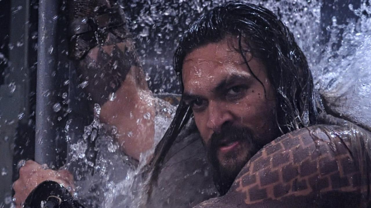 Arthur Curry/Aquaman (played by Jason Momoa) storms a submarine under attack by pirates in an early scene from film Aquaman