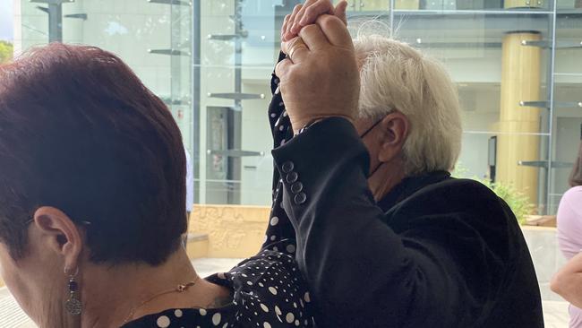 Harold Ernest Lawrence, 59, leaves Ipswich District Court with his wife after he was sentenced on child sex offences dating back to 1997.