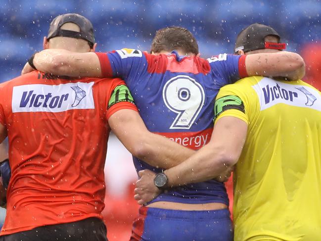 NEWCASTLE, AUSTRALIA - JULY 26: Andrew McCullough of the Knights is taken from the ground during the round 11 NRL match between the Newcastle Knights and the Canterbury Bulldogs at McDonald Jones Stadium on July 26, 2020 in Newcastle, Australia. (Photo by Mark Kolbe/Getty Images)