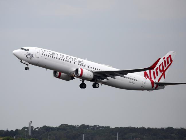 SYDNEY, AUSTRALIA - NewsWire Photos OCTOBER 08, 2020 - A Virgin Australia plane takes off at Sydney Airport on Thursday October 08, 2020.Picture: NCA NewsWire / Christian Gilles