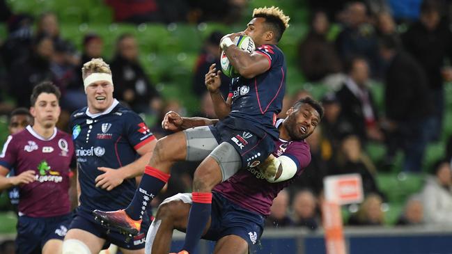 Queensland’s Samu Kerevi earned a yellow card for this challenge on Rebels halfback Will Genia. Picture: AAP