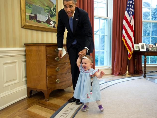 April 4, 2014: “Despite the haphazard framing, I love the expressions on the President and one-year-old Lincoln Rose Smith as she learns to walk in the Oval Office. This moment happened when former Deputy Press Secretary Jamie Smith and her family stopped by for a departure greet and photograph with the President.” Picture: Official White House Photo by Pete Souza