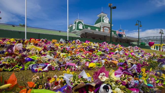 Floral tributes left at Dreamworld after the tragic malfunction on the Thunder River Rapids Ride which led to the deaths of four people. Picture: Glenn Hunt