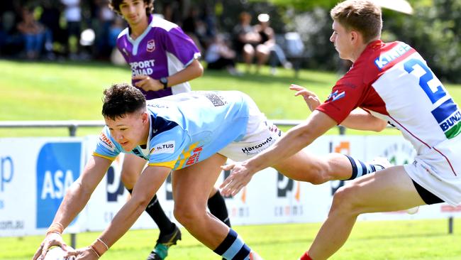 Norths Devils player Tyreece Tait gets a try . Picture, John Gass