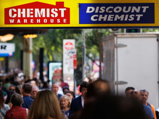 SYDNEY, AUSTRALIA - NewsWire Photos, October 29 2024. GENERIC. Inflation. Shopping. Retail. Economy. Cost of living crisis. Crowded footpath beneath a Chemist Warehouse sign. Picture: NewsWire / Max Mason-Hubers