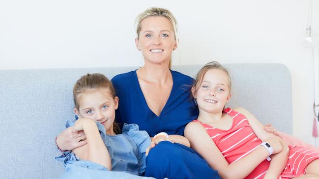 Author and yoga teacher Tina Bruce at home with daughters Leila Bruce, 9, and Zoe, 8. Picture: Prue Aja