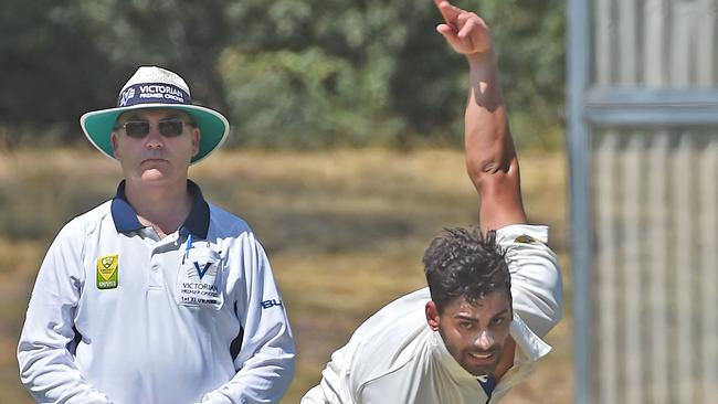 A Premier Cricket umpire watches on as Frankston Peninsula’s Ben Ashkenazi lets fly.