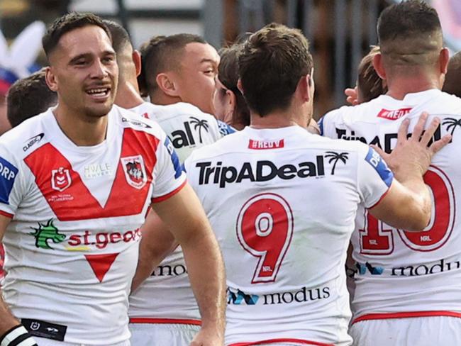 NEWCASTLE, AUSTRALIA - APRIL 04: St George players celebrate a try during the round four NRL match between the Newcastle Knights and the St George Illawarra Dragons at McDonald Jones Stadium, on April 04, 2021, in Newcastle, Australia. (Photo by Ashley Feder/Getty Images)