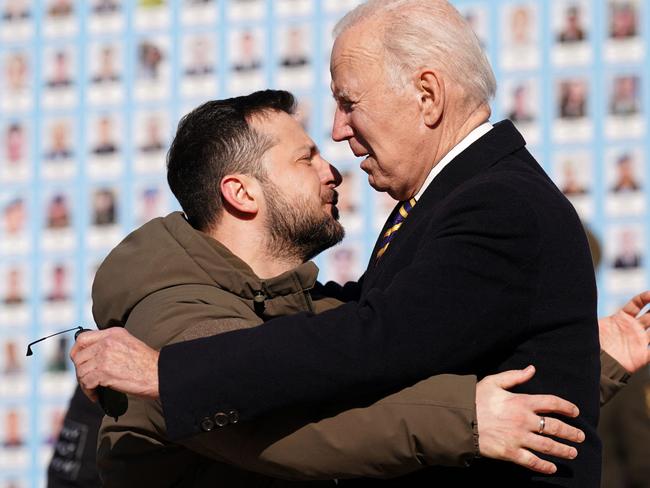 US President Joe Biden (R) is greeted by Ukrainian President Volodymyr Zelensky (L) during a visit in Kyiv on February 20, 2023. - US President Joe Biden made a surprise trip to Kyiv on February 20, 2023, ahead of the first anniversary of Russia's invasion of Ukraine, AFP journalists saw. Biden met Ukrainian President Volodymyr Zelensky in the Ukrainian capital on his first visit to the country since the start of the conflict. (Photo by Dimitar DILKOFF / AFP)